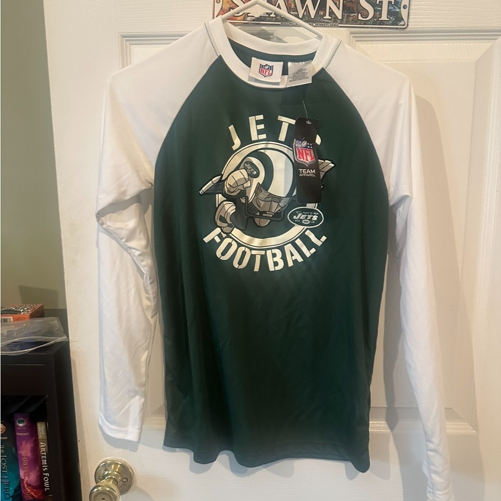 Two authentic Jets shirts and jets towel